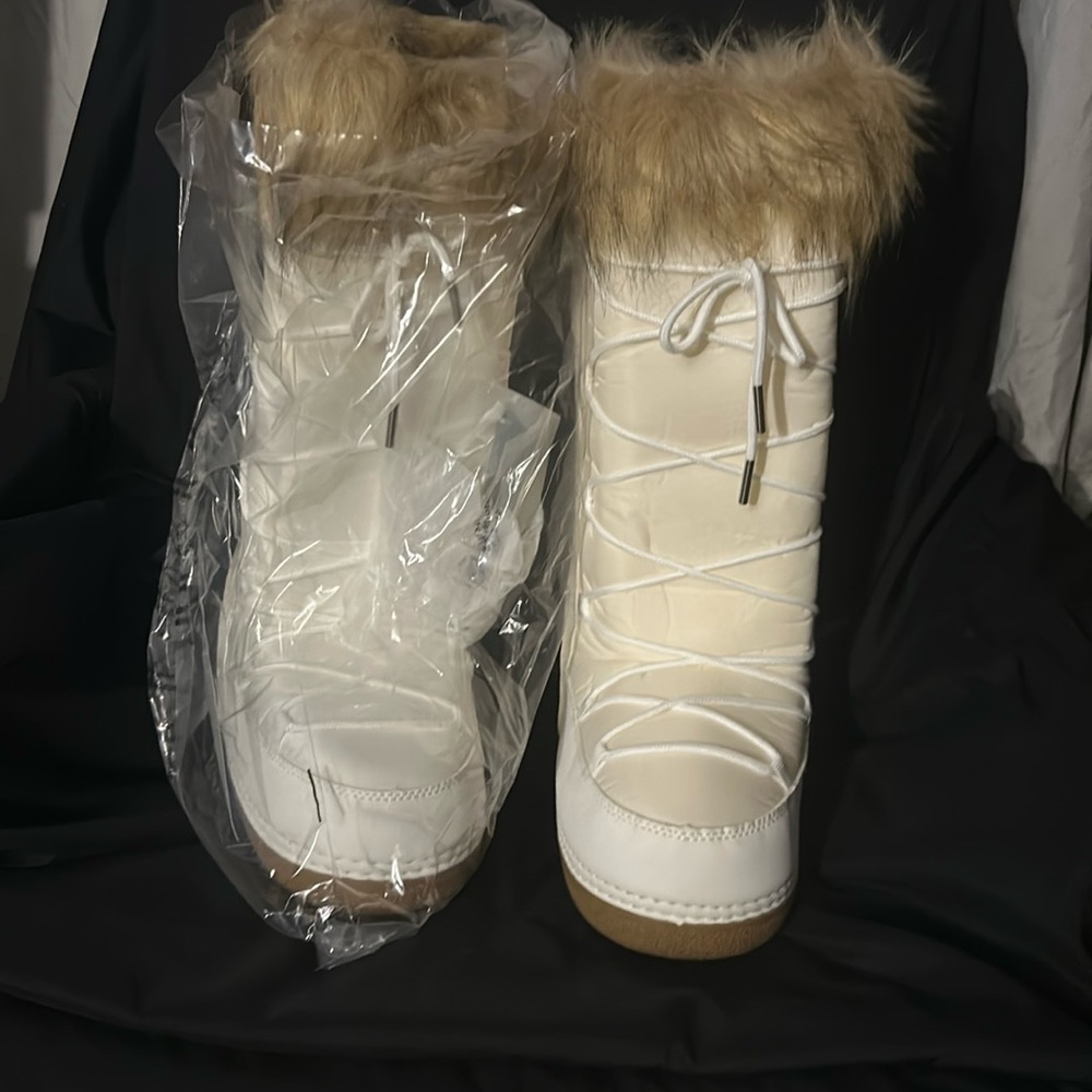 Brand new in package white boots